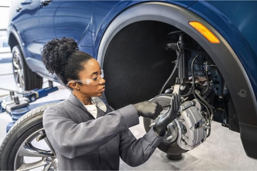 Woman Fixing Brake