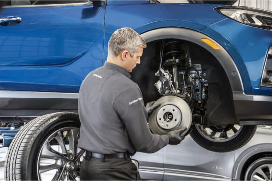 Man Replacing Brake